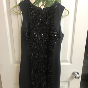 Calvin Klein black dress with sequins.